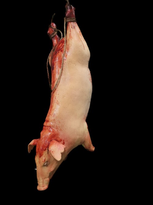 GUTTED PIG-HANGING WITH ROPE-BLOODY FINISH