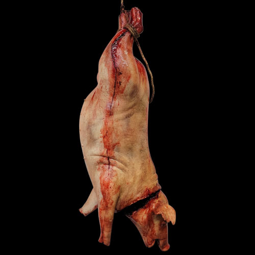 LARGE PIG W/SEVERED NECK
